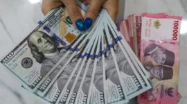 ilustrasi mata uang dolar dan rupiah.