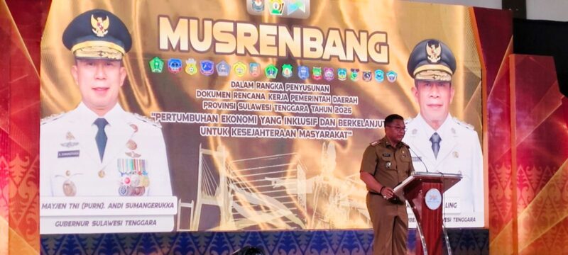 Kepala Bappeda Sultra J Robert saat menyampaikan laporan dalam pembukaan Musrenbang 2025 di Kota Baubau.